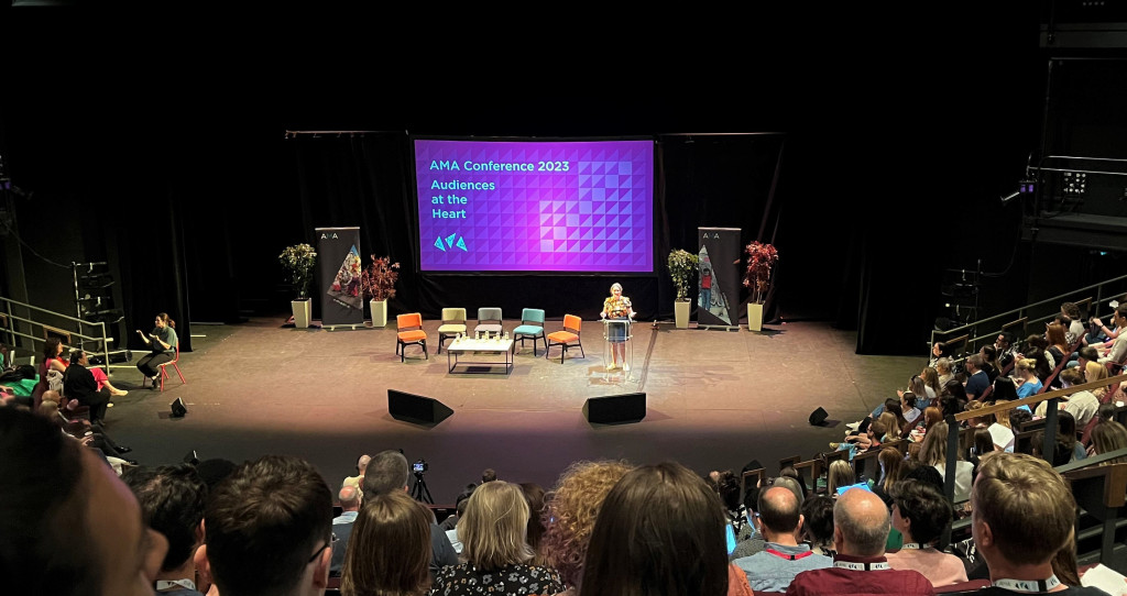 A photo of the opening session from the AMA Conference 2023 at Leeds Playhouse
